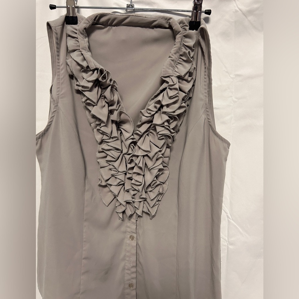 White ruffled top